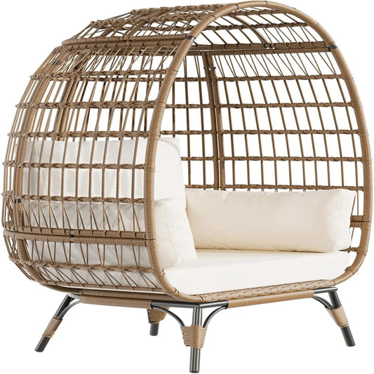 Oversized wicker egg chair with cushions and steel frame