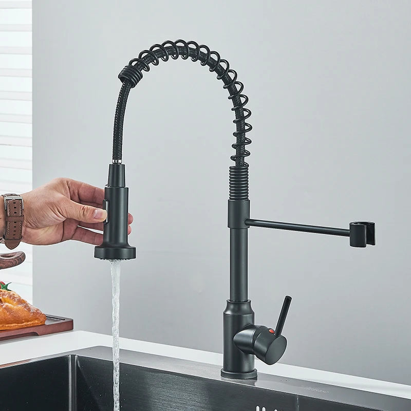 Single handle pull-down kitchen faucet with swivel nozzle
